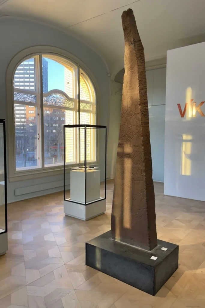 The Dynna Stone, a runestone from the late Viking Age originally located in Gran, Norway, as the centrepiece of the VÍKINGR exhibition in the Historical museum in Oslo.